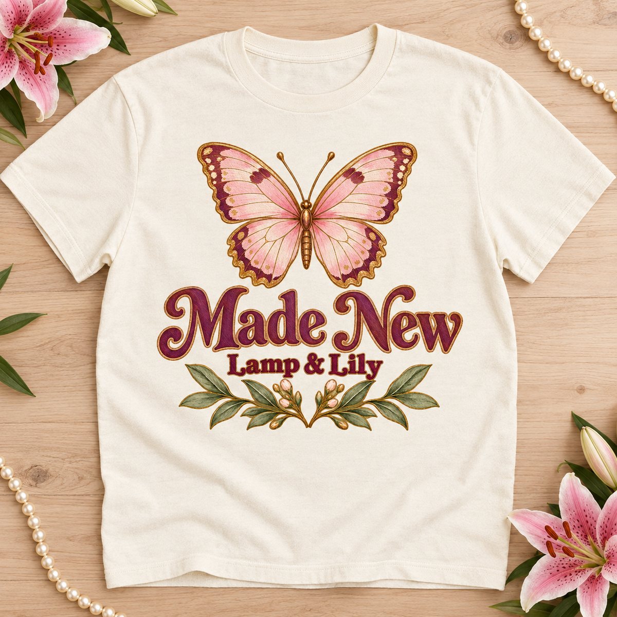 Made New Lamp & Lily tee with a floral faith design, inspired by 2 Corinthians 5:17