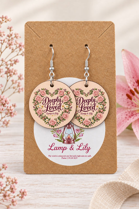 Deeply Loved round Lamp & Lily earrings on silver hooks displayed on a kraft earring card