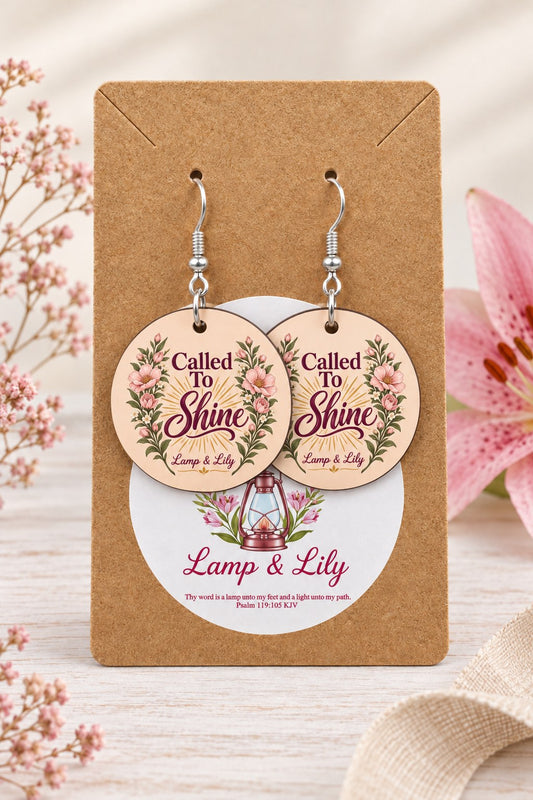 Called to Shine round Lamp & Lily earrings on silver hooks displayed on a kraft earring card