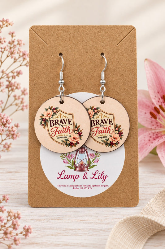 Brave in Faith round Lamp & Lily earrings on silver hooks displayed on a kraft earring card