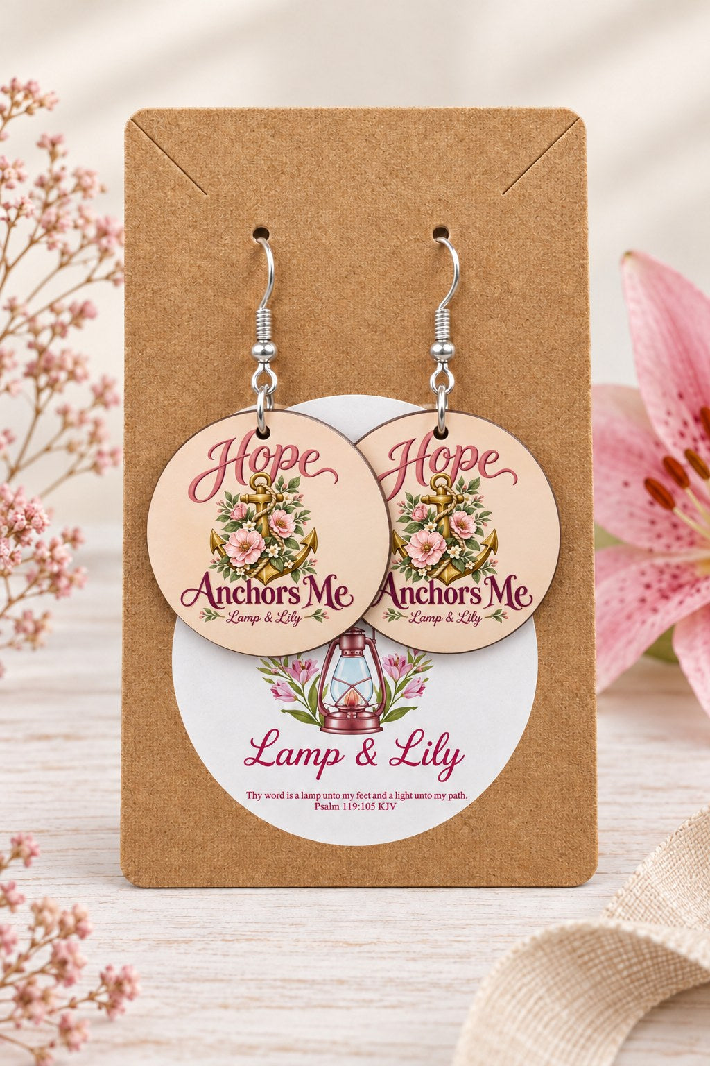 Hope Anchors Me round Lamp & Lily earrings on silver hooks displayed on a kraft earring card