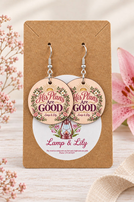 His Plans Are Good round Lamp & Lily earrings on silver hooks displayed on a kraft earring card