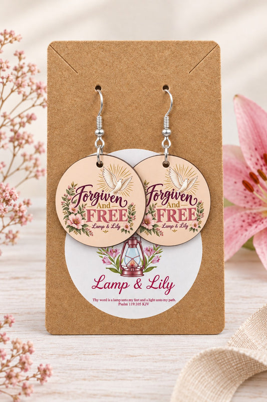 Forgiven and Free round Lamp & Lily earrings on silver hooks displayed on a kraft earring card