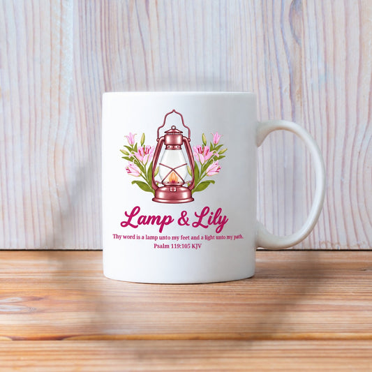 White Lamp & Lily coffee mug with rose-gold lantern, pink lilies and Psalm 119:105 KJV verse on a wood shelf